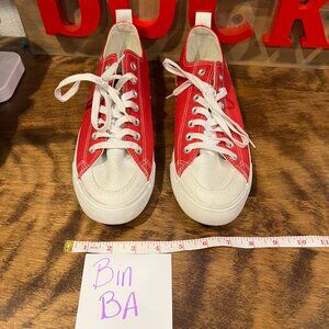 Skicks Wisconsin Badgers red/white women’s 11/ Mens 9 athletic tennis shoes
